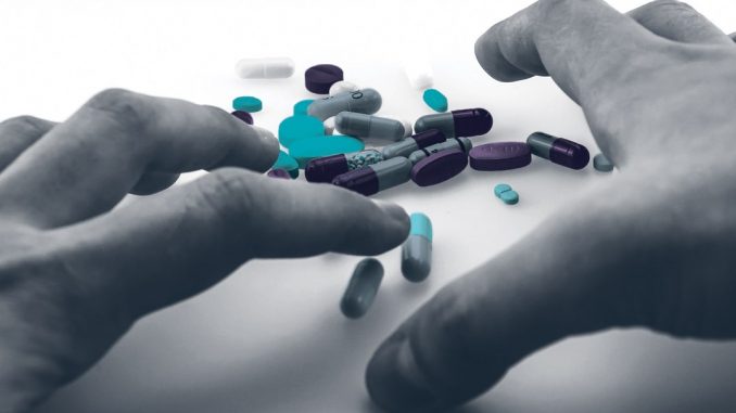 HandsReachingforPills HandsReachingforPills